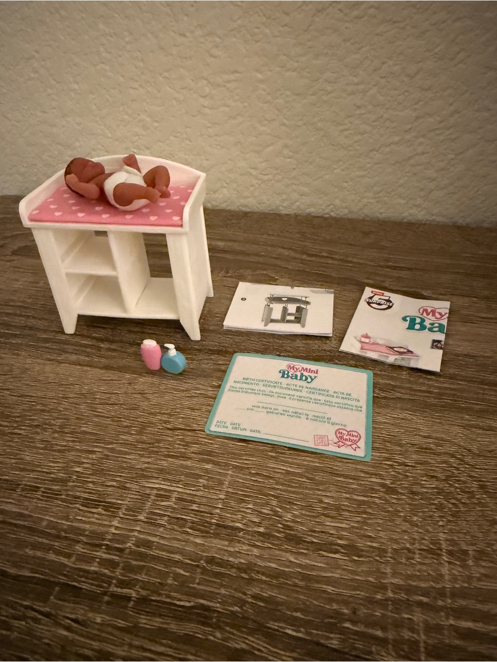 The Zuru My Mini Baby Series 1 Rare Pink Changing  Table Set with Baby